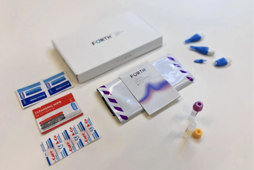 At-home laboratory testing kit with blood sample collection supplies, lancets, collection tubes, and shipping materials for comprehensive metabolic panel and hormone biomarker analysis - remote health testing - InfoProds 2026
