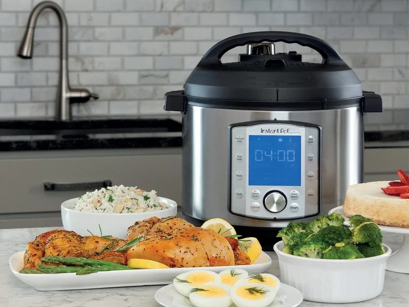 Instant Pot pressure cooker with steam releasing showing modern multi-function cooking appliance