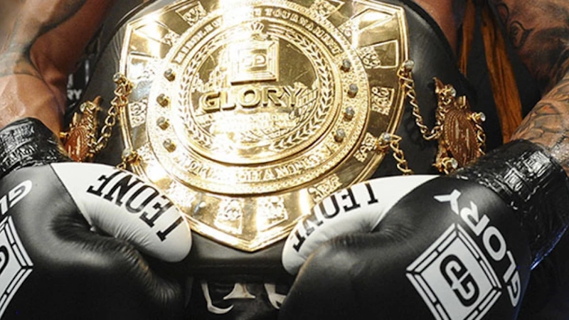 Professional boxing championship belt and gloves representing weight class divisions and competitive advantages gained through strategic weight manipulation in combat sports revealing regulatory loopholes and fighter tactics InfoProds 2026