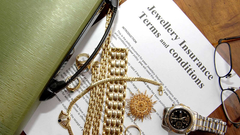 Diamond engagement ring with appraisal certificate and insurance documents showing importance of jewelry documentation