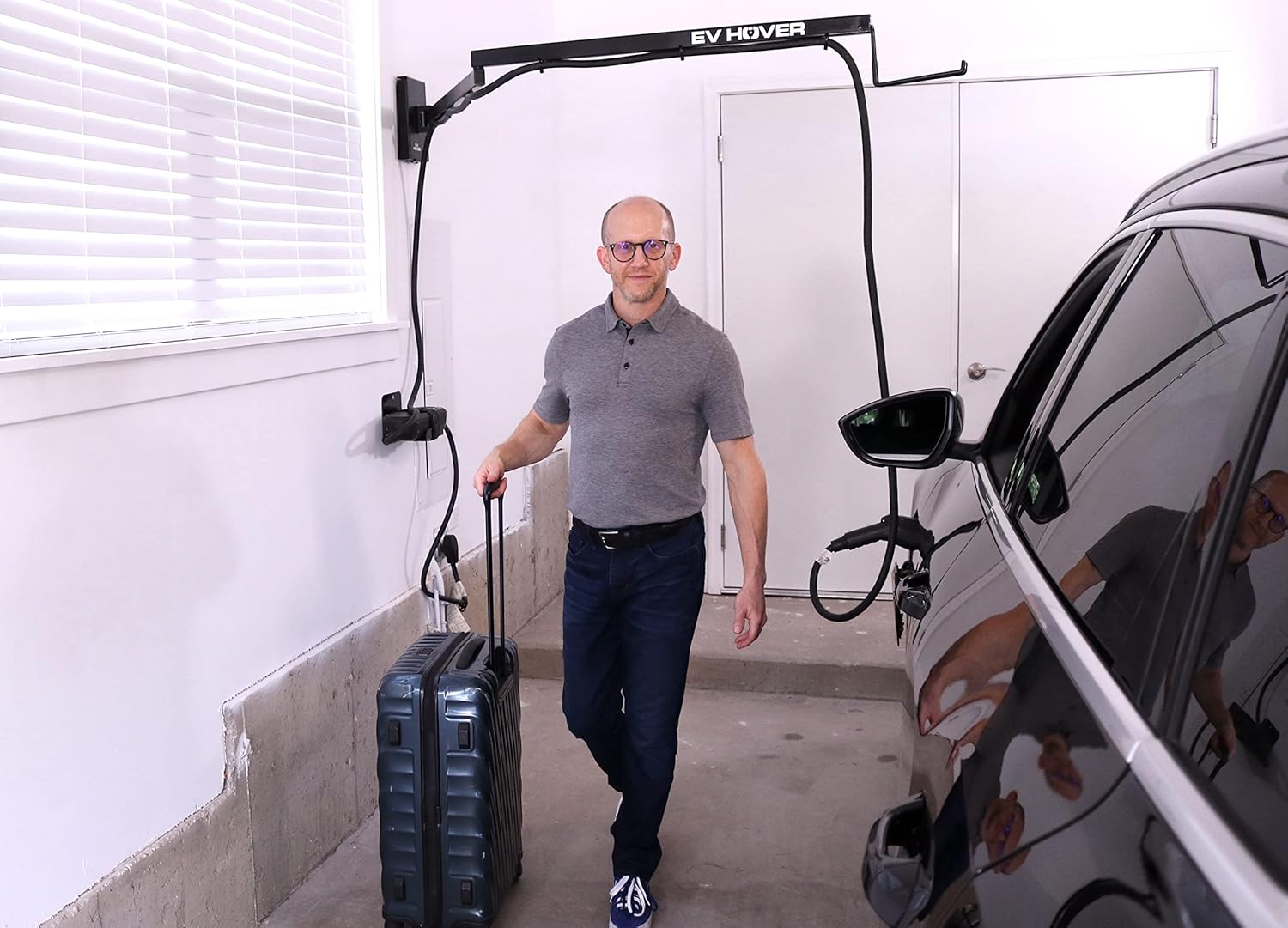 Professional cable organization system demonstrating retractable charging cable reel, weatherproof storage bag, and figure-eight coiling technique for EV charging cables preventing tangling and extending equipment lifespan - InfoProds 2026