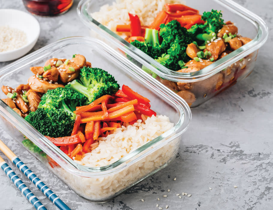 Glass and plastic meal prep containers in various sizes for storing prepared meals and ingredients