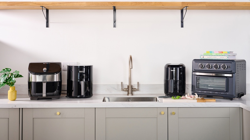 Energy Consumption Results - Air Fryer Saves 40-60% vs Oven Electricity usage meter showing energy consumption comparison between cooking appliances