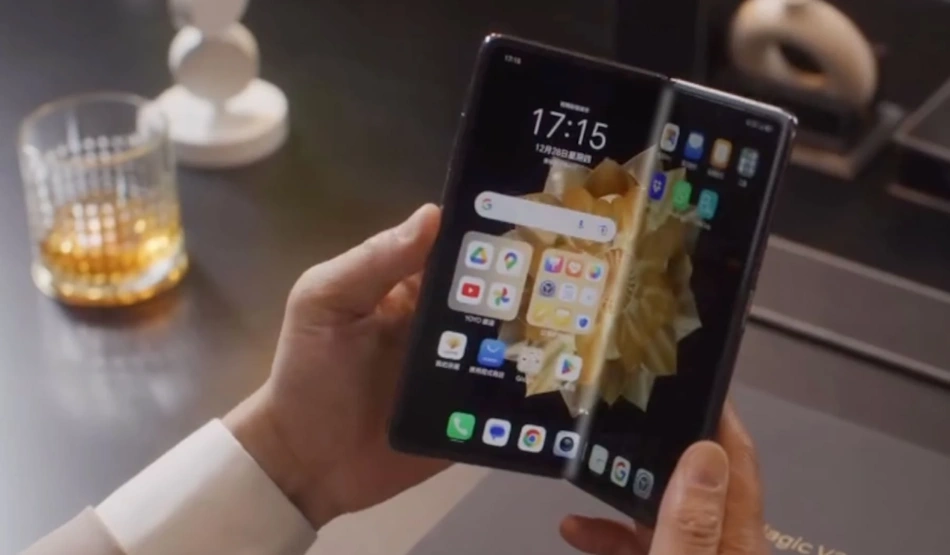 Traditional foldable smartphone display showing characteristic visible crease line along fold axis, demonstrating plastic deformation that occurs in conventional ultra-thin glass and polyimide substrate materials after repeated folding cycles, highlighting engineering challenges overcome by Samsung creaseless technology - InfoProds mobile display comparison 2026
