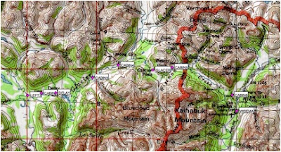 Professional navigation equipment spread on forest floor including detailed topographic maps, magnetic compass, GPS device with backup batteries, demonstrating proper wilderness navigation techniques versus unreliable natural indicators like moss patterns - InfoProds 2026