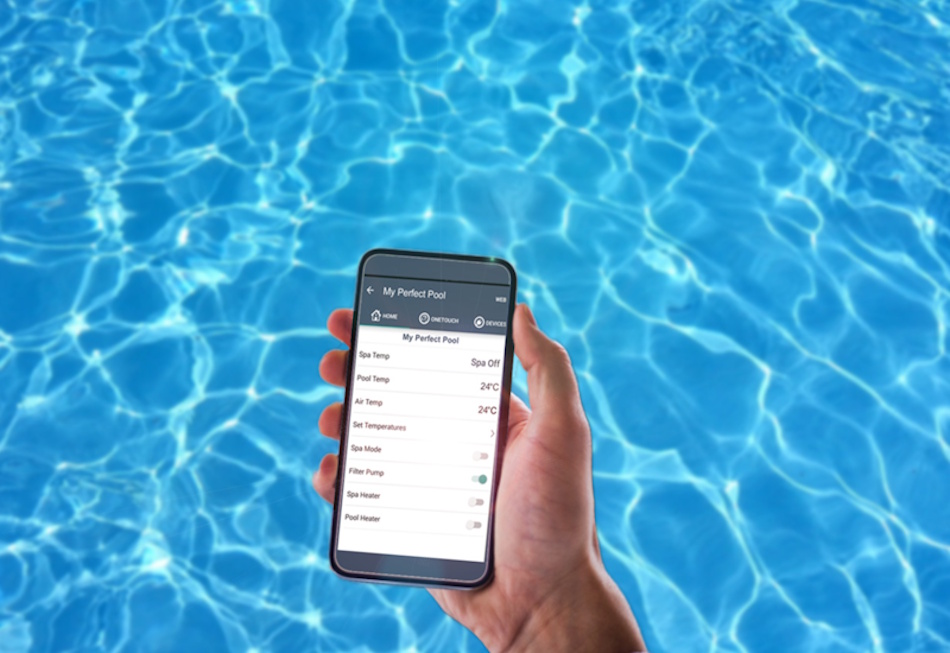 Contemporary residential swimming pool equipped with advanced AI chemical monitoring sensors and smartphone control technology showing crystal clear blue water, automated cleaning equipment, and integrated smart home monitoring devices for comprehensive pool maintenance management - InfoProds 2026