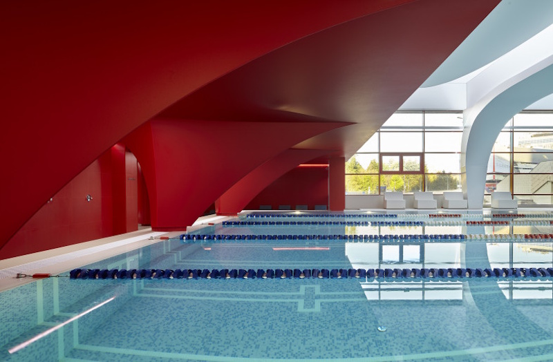 Advanced conceptual design for future Olympic swimming venue incorporating cutting-edge wave elimination technology modular construction methods and artificial intelligence water quality management systems - InfoProds 2026