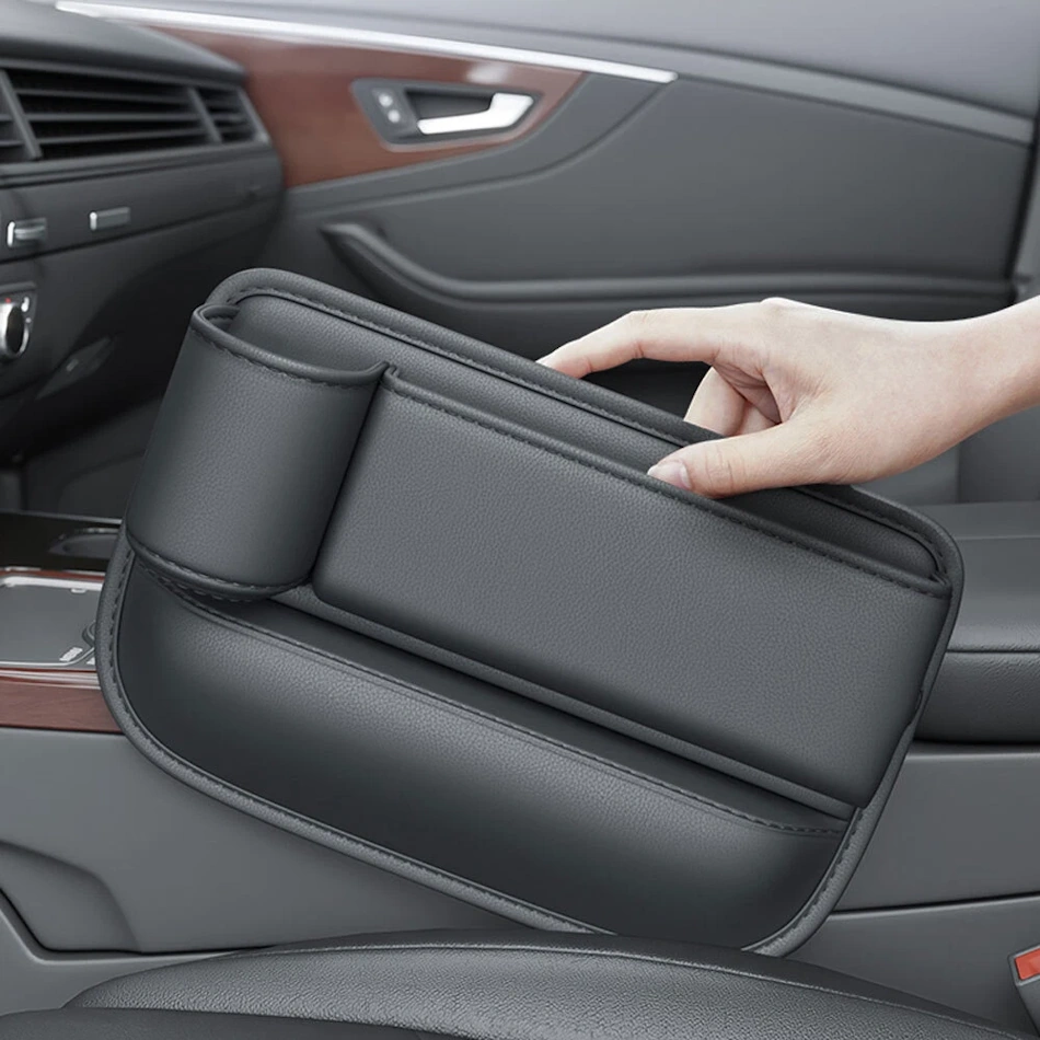 High-quality automotive gap filler showcasing premium genuine leather cover with reinforced stitching, memory foam core construction, and integrated organizational features including phone cradle, USB charging ports, and storage compartments for complete vehicle interior organization - InfoProds 2026