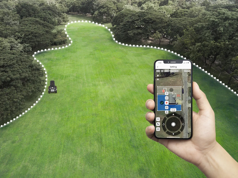 Mobile phone displaying robotic lawn mower app interface with GPS virtual boundary mapping, systematic parallel stripe coverage pattern visualization, multi-zone management features, real-time mower position tracking - InfoProds Smart Mower Technology 2026