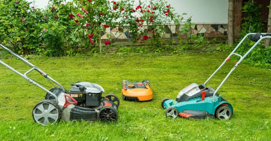 Side-by-side comparison of quiet electric robotic lawn mower operation versus loud gas-powered traditional mower, emissions visualization, environmental impact difference, EPA air quality standards compliance demonstration - InfoProds Green Technology 2026