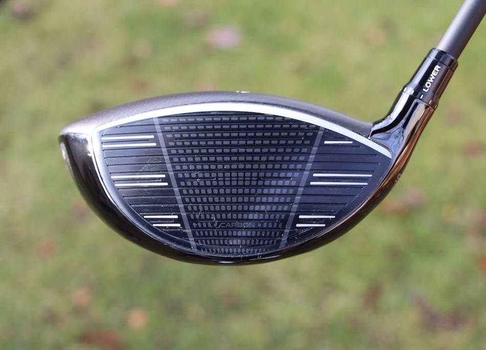 Professional titanium golf driver with adjustable weights and carbon fiber crown displaying spring-like face technology that revolutionized distance in professional golf tournaments analyzed by USGA for 2028 ball rollback regulations - InfoProds 2026