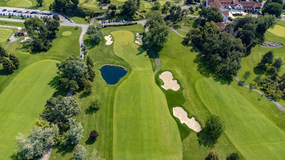 Classic championship golf course featuring historic architectural design elements threatened by professional driving distance increases requiring expensive lengthening modifications or obsolescence from tournament rotations - InfoProds 2026