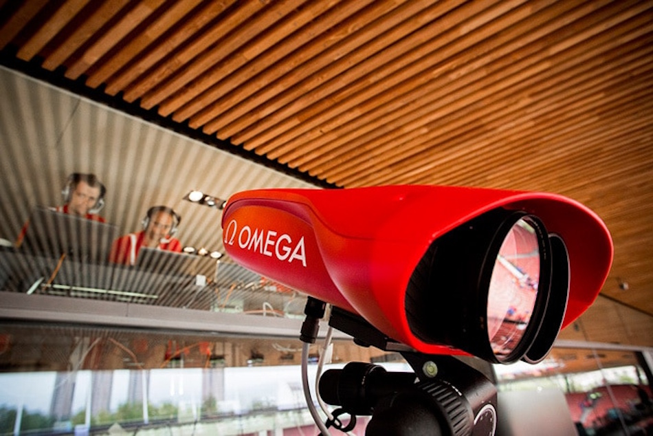 High-speed photo finish timing equipment and camera system used at Olympic athletics championships showing precision measurement technology for sprint races - Sports timing technology guide InfoProds 2026