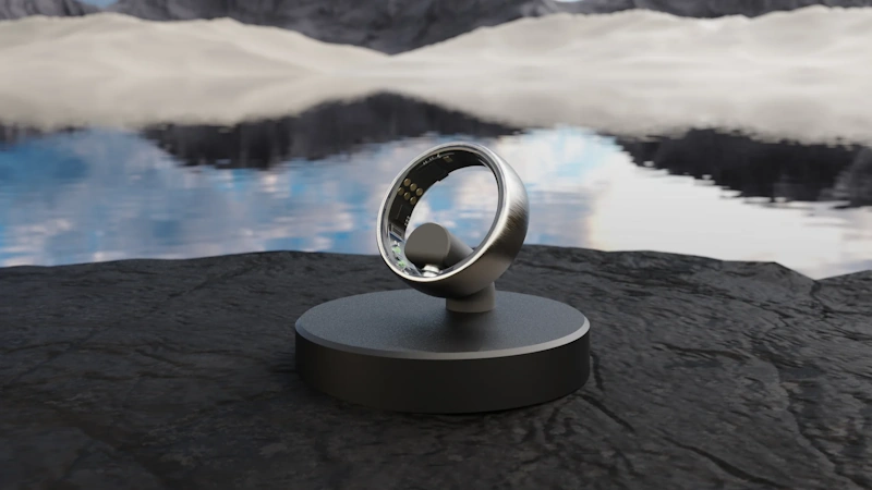 Smart ring wireless charging dock with magnetic connection LED indicator showing health tracking jewelry battery recharging station wearable device technology accessories InfoProds 2026