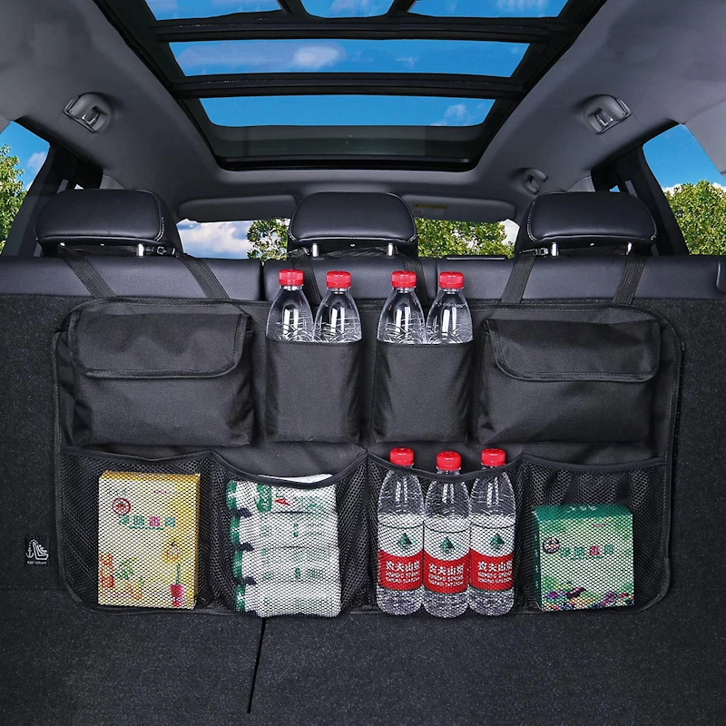 Vertical car storage solutions featuring backseat organizers with multiple pockets, headrest hooks, and over-seat storage panels maximizing unused vertical space for enhanced vehicle organization - InfoProds 2026